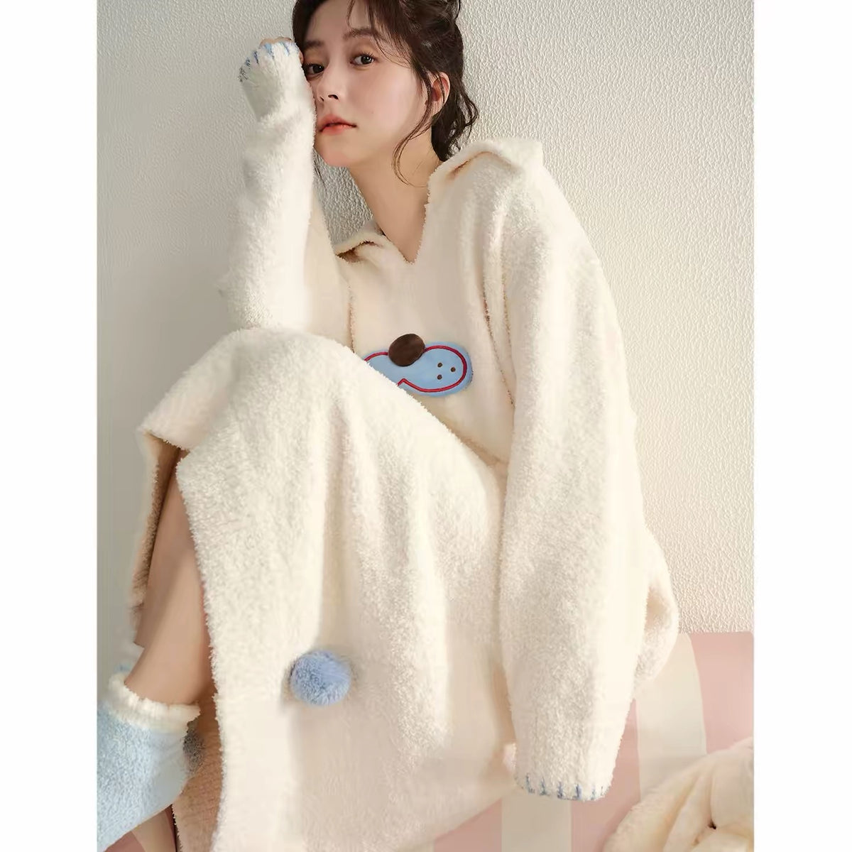 Soft, fluffy fleece nightdress with a collar, pom-pom and blue stitching. Warm, cozy winter loungewear from Rosie Rue.